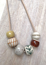 Load image into Gallery viewer, Ceramic Beaded Necklace - Mustard Oval/Green Leaves